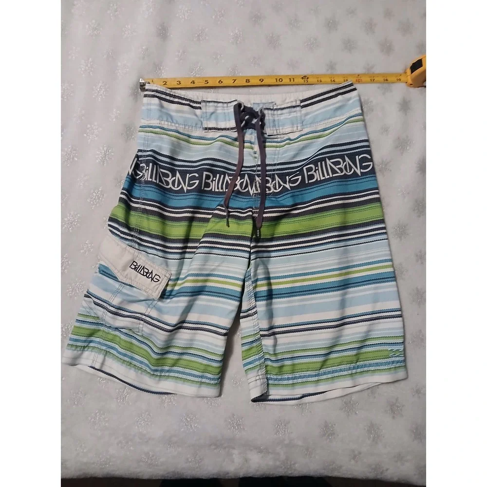 Billabong Board Shorts Size 30 with an attached fire starter and bottle opener